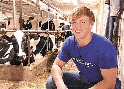 Matt Seykora is the captain of the Owatonna High School football wrestling and baseball teams. When he is not playing sports, the 17-year-old senior helps with chores on his parents’ 50-cow dairy near Owatonna, Minnesota.  PHOTO BY KRISTA KUZMA