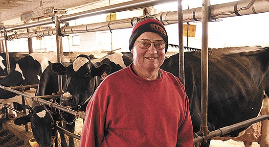 Dale Spindler stands in the tiestall barn where he milks his herd of 44 cows on his dairy near Owatonna, Minnesota. Spindler received the 2020 Steele County Farm Family of the Year award. PHOTO BY KRISTA KUZMA
