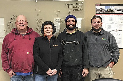 The management team at Drumgoon Dairy, of Lake Norden, South Dakota, includes – (from left) Rodney and Dorothy Elliott, herd manager Andy Weber and David Elliott. Drumgoon Dairy had a pregnancy rate of 34% last year, and it is currently at 35% for their herd of 5,100 cows. PHOTO BY JERRY NELSON
