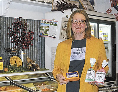 Beth Wells-Leis recently built upon her farmers’ marketing experience to open an on-farm store on the dairy farm where she milks 42 cows and raises beef, pigs, sheep and chicken near Sparta, Wisconsin. PHOTO BY DANIELLE NAUMAN