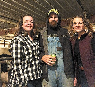Dana Johnson (right) works for Maddie Schmidt (left) and Bronson Schultz on their 48-cow dairy near Tomah, Wisconsin. Johnson met Schmidt and Schultz when she was looking for a way to become involved in showing dairy cattle. PHOTO SUBMITTED