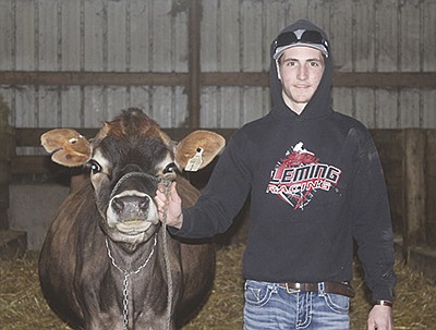 Brock Hoskins is a junior at Westby High School and works part time at Peters Farm near Chaseburg, Wisconsin. PHOTO BY DANIELLE NAUMAN