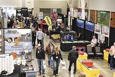 Visitors walk through the tradeshow of the Central Plains Dairy Expo March 24 at the Denny Sanford Premier Center in Sioux Falls, South Dakota.  PHOTO BY MARK KLAPHAKE