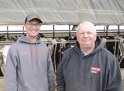 Adam (left) and Randy Erickson milk 515 cows and farm 1,300 acres at Erickson Dairy Farm near Clintonville, Wisconsin. The Ericksons are in the process of transitioning the farm to Adam. PHOTO BY STACEY SMART