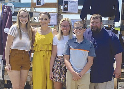Justin Schroepfer (right) pictured with his family – (from left) Mia, Sara, McKenzie and Korbin – is the winner of the Wisconsin Farm Bureau’s inaugural Heroes of Hope campaign. He milks 86 cows with his family on their farm in Langlade County near Bryant, Wisconsin.  PHOTO SUBMITTED