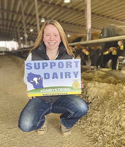 Elizabeth Katzman created a ‘Support Wisconsin Dairy’ yard sign campaign last year to support dairy farmers in her community struggling through the coronavirus pandemic. Katzman, the daughter of Wes and Katy Katzman, who own and operate a 3,000-cow dairy near Whitewater, Wisconsin, sold 1,000 signs and raised $10,000. PHOTO SUBMITTED