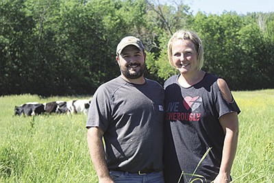 Tom Moos and Deb Jakubek milk 35 grass-fed cows once a day on their organic dairy farm near New Auburn, Wisconsin.