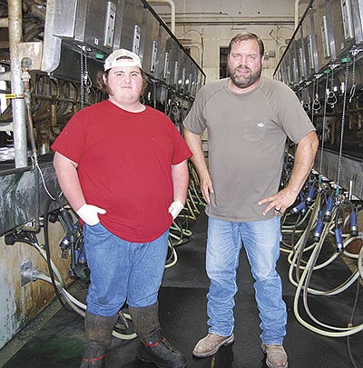 Hunter Thompson works for Mike Whittle at Whittle Farms near Volga, Iowa. Thompson recently graduated from Edgewood-Colesburg High School. PHOTO BY SHERRY NEWELL