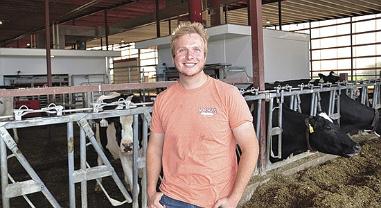 Ryan Horsens farms with his parents, Jeff and Connie, at Horsens Homestead near Cecil, Wisconsin. The Horsens milk 1,200 cows, over half of which are milked by 12 Lely A5 robots. PHOTO BY STACEY SMART