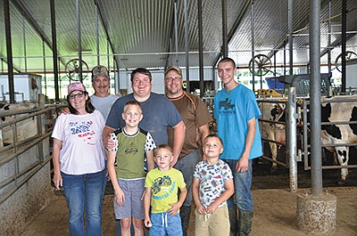 The Olson family and employees – (front, from left) Luke, Reid and Evan Olson; (back, from left) Cindy, Kurt and Kurt Jr. Olson, Jeremy Schmidt and Tyler Giddings – milk 630 cows and crop farm 1,450 acres near Birnamwood, Wisconsin. Not pictured are Kurt Jr.’s wife, Krysta, and their son, Carter. PHOTO BY STACEY SMART