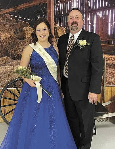 Haley Beukema, pictured with her father Paul, is crowned the National Guernsey Queen in July at the National Guernsey Convention in Seven Springs, Pennsylvania.  PHOTO SUBMITTED