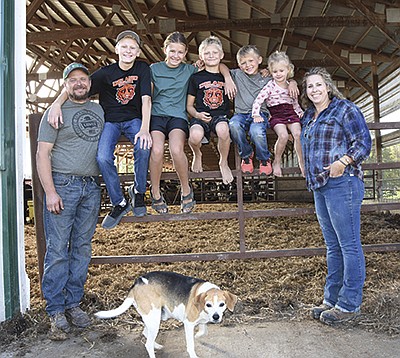 John and Kara Czanstkowski and their children – (from left) Leland, Lily, Levi, Lewis and Leona – milk 220 cows near Delano, Minnesota.  PHOTO BY MARK KLAPHAKE