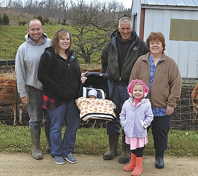 The Orth family – (front) Jaylee; (back, from left) Derek, Charisse, Callum, Randy and Laura – stand in their yard Nov. 15 near Lancaster, Wisconsin. The family milks 250 Jerseys. PHOTO BY ABBY WIEDMEYER
