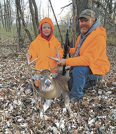 Chad Schlauderaff and his son, Kiptin, pose with their 10-point buck they shot Nov. 8. The Schlauderaffs tagged the buck near the farm site where the Schlauderaffs’ heifers are raised near Vergas, Minnesota. PHOTO SUBMITTED