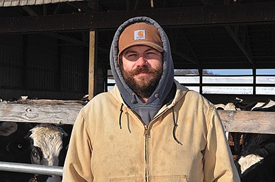 Benjamin Brunken stands by his dry cows Jan. 10 on his 55-cow dairy near Reedsburg, Wisconsin. PHOTO BY ABBY WIEDMEYER