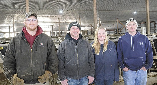 The Hildebrandt siblings – (from left) Kevin, Michael, Angie and Ray – milk 950 cows and farm 2,000 acres near South Beloit, Illinois. The farm is owned by their parents, Ken and Amy, and their uncle, Don.  PHOTO BY STACEY SMART