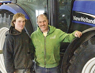 Dan Richter and his dad, Mark, farm together on their 100-cow dairy in Wadena Minnesota. Dan is a senior at Verndale High School.  PHOTO BY GRACE JEIRISSEN