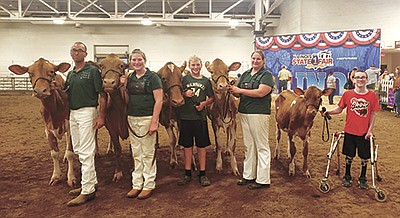 The Dindermans – (from left) Brian, Alaina, Amery, Kristi and Aidan – milk 90 cows in Stephensen County near Orangeville, Illinois. PHOTO SUBMITTED