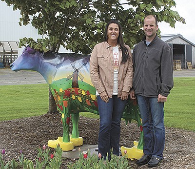 Amy and Sander Penterman own and operate Dutch Dairy near Thorp, Wisconsin. They are celebrating 20 years since Sander purchased and established the Clark County Farm. PHOTO BY DANIELLE NAUMAN