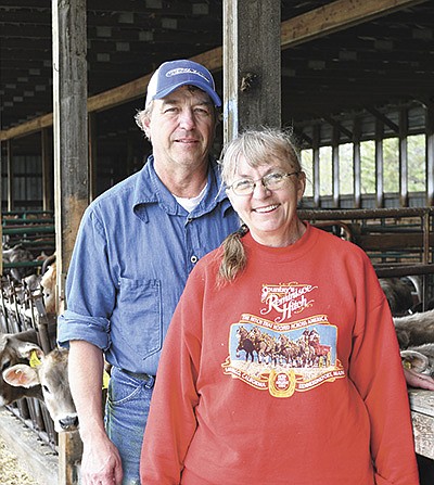 Brian and Barbara Kimm stand by their heifer raising facility May 18 at their farm near Pelican Rapids, Minnesota. In 2021, the Kimms where recognized as a Minnesota Purebread Dairy Cattle Association Distinguished Breeder. PHOTO BY GRACE JEURISSEN