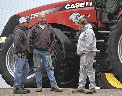  Aaron, Andy and Larry Nelson discuss field work plans May 23 on their farm near Richland Center, Wisconsin. The family crop farms 1,500 acres. PHOTO BY ABBY WIEDMEYER