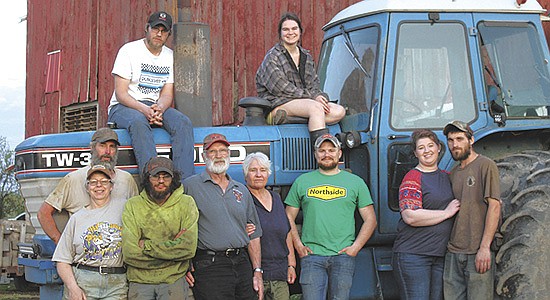The Bores family – (front, from left) Todd, Patti, Riley, Ralph and Bette Bores, Houston Olson, Heather Ertl and Collin Bores; (back, from left Reid and Kenni Bores – milks 50 cows on their Auburndale, Wisconsin farm. The family boasts four generations of service in the local fire and EMS departments. PHOTO BY DANIELLE NAUMAN