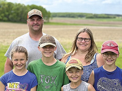 Nathan and Nikki Deyle and their children – (from left) Sydney, Lucas, William and Zachary – milk 50 cows with Nikki’s brother Jakin Tyrrell and his wife, Amanda, in Todd County near Browerville, Minnesota. PHOTO SUBMITTED