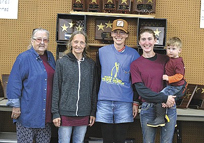 Five generations of Punk Montgomery’s family – (from left) Charlotte Tetzlaff, Punk Montgomery, Tiffanee Tesmer and Kellisa Carlisle holding David Gage – have taken part in the last two Make Their Hearts Smile truck convoys raising money for the Wisconsin Make-A-Wish Foundation.  PHOTO SUBMITTED
