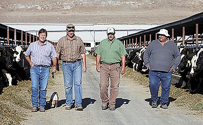 The Bateman brothers – Steve (from left), Brad, Jason and the late Lance Bateman – are the managing partners of Bateman’s Mosida Farms near Elberta, Utah. The Batemans milk 8,000 cows and farm 3,500 acres. PHOTO SUBMITTED