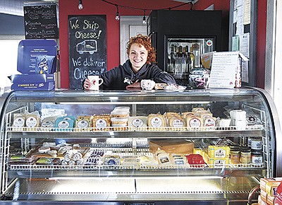 Cheesemaker Alise Sjostrom stands at the store counter Sept. 30 in Redhead Creamery in Brooten, Minnesota. At Jer-Lindy Farms, 12% of the milk production is used for the creamery. PHOTO BY TIFFANY KLAPHAKE