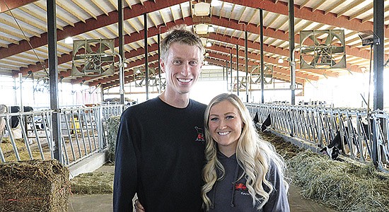 Tanner Schmaling and his wife, Maddie, own and operate Maple-Leigh Futures where they board donors and show cattle near Delavan, Wisconsin. Tanner broke his neck in a swimming accident in January while vacationing with his family in Hawaii and has since learned to walk again.  PHOTO BY STACEY SMART