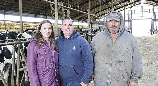 The Ferry family – Shianne (from left), Brandon and Tim – milk 300 cows near Brillion, Wisconsin. The Ferrys combined herds at a rented facility in 2019 to help reduce labor and provide more consistent feed. PHOTO BY STACEY SMART