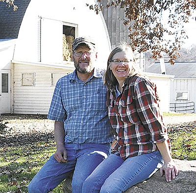 Robert and Beth Kroening relax at their farm Nov. 1 near Stillwater, Minnesota. They were named the Washington County Farm Family of the Year.  PHOTO BY TAYLOR JERDE