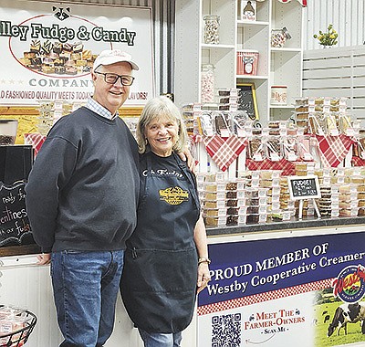 Steve and Linda Schulte take a break Jan. 9 at Valley Fudge and Candy near Coon Valley, Wisconsin. The couple has been making fudge for six years and has international wholesale customers. PHOTO BY ABBY WIEDMEYER