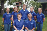 The Holtegaard family received the 2008 Olmsted County Farm Family of the Year award. All five Holtegaard children agree that their time working on the farm helped them grow as individuals and strengthened their character. Front row: Roger and Melinda. Back row from left: Annabelle, Courtney, Nathan, Portia and Marjorie. (photo by Krista Sheehan) 