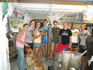 Amanda Wagner invited her SCSU women’s basketball teammates to her family’s dairy farm last October. Joining Amanda (left) on the farm were (from left) Lauren Carew, Hannah Swiener, Jessica Benson, Morgan Lof, Megan Foley, Reyan Robinson and Jodie Gerkind. (photo submitted)