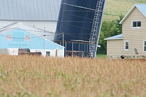 This 20- by 90-foot Harvestore silo began leaning this past January due to a rip in the steel, about 10 feet above the base. The silo is located on Tim Pronschinske’s farm in Trempealeau County near Arcadia, Wis. (photo by Laura Seljan)