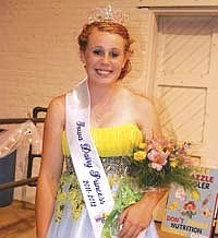 Iowa Dairy Princess, Gina Fisher, is promoting dairy as well as working on her family’s dairy farm near Edgewood, Iowa. (Photo submitted)