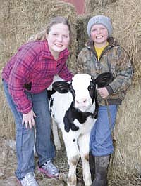 Sianna and Noah Mayers are the children of Maurice and Char of Freeport, Minn. Together they milk 76 cows. (Photo by Mark Klaphake)
