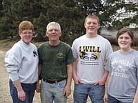 Barb and Bob Petit are pictured with their two children, Tyler (18) and Kelsey (19), who help on the farm when not at school or away at college. Bob and Barb said a dairy farm is a good place to raise a family and teach them responsibility. (photo submitted)