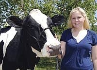 Beth Nelson had no idea her cow Hazel-Bush Flap Flower would become the Holstein Association USA’s “Star of the Breed.” In 2011, not only did Flower crank out 59,160 pounds of milk in 365 days, she also did well at shows and is classified Excellent 92. Beth works on the farm of her parents, Lee and Becky Nelson, in Blair, Wis., and hopes Flower might be the foundation of her herd.<br /><!-- 1upcrlf -->PHOTO BY RON JOHNSON