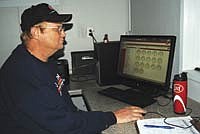 A robot lets Dennis Amundson spend more time analyzing herd data than actually milking. His Norsk Jerseys, Westby, Wis., has the first such milker in Vernon County.<br /><!-- 1upcrlf -->PHOTO BY RON JOHNSON