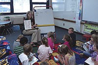 Tina (Rettmann) Hoff, the 51st Princess Kay, teaches her kindergarten class. She tells the children about her dairy background in her curriculum and sends supplemental information home with students, where she now teaches at the army base at Fort Bragg, N.C.<br /><!-- 1upcrlf -->PHOTO SUBMITTED