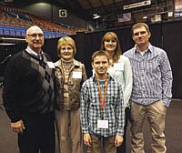 David and Jerilyn Hansen family were the featured family at the 2013 Ag Prayer Breakfast. In 1989, the Hansens started a mission called Helping Hands for Haiti. The Hansens are, from left, David and Jerilyn, their grandson Gavin, their daughter Nicole and her husband, Brian Spurrell.  The Hansens dairy near Irene, S.D.,<br /><!-- 1upcrlf -->PHOTO BY JERRY NELSON