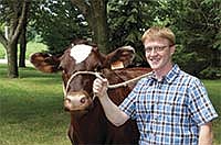 Cory Salzl is the new executive secretary for the American Milking Shorthorn Society. He is also managing his herd of Milking Shorthorns on his home farm near Eden Valley, Minn.<br /><!-- 1upcrlf -->PHOTO BY MISSY MUSSMAN