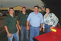 A 400-cow dairy farm near De Soto, Wis., hosted the recent Vernon County Holstein Twilight Meeting. The farm of Kevin Walleser and his wife, Anne Marie Elwing, and their twin sons, William (far left) and Emil, includes 1,620 acres and a beef herd.<br /><!-- 1upcrlf -->PHOOT BY RON JOHNSON