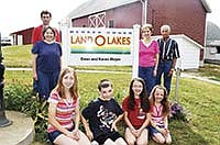 The Meyer family from Greenwald, Minn., were honored as a Century Farm. They are pictured front row, from left, Sarah (14), Aaron (12), Kristin (11) and Kayla (9). Back row from left, Dean, Karen, Darlene and Cyril Meyer.<br /><!-- 1upcrlf -->PHOTO BY MISSY MUSSMAN