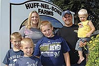 The Nelson family, (from left) Brock, Darin, Holly, Zach, Aaron, and Easton, milks 185 cows on their farm in Richland County near Richland Center, Wis. <br /><!-- 1upcrlf -->PHTOO BY RON JOHNSON