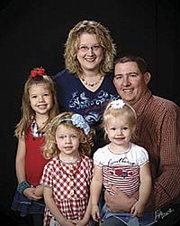 David Foster, shown here with his wife, Addi, and their daughters – Ansley, Nayla, and Davina – milk 140 cows at Foster Dairy near Fort Scott, Kan.<br /><!-- 1upcrlf -->PHOTO SUBMITTED