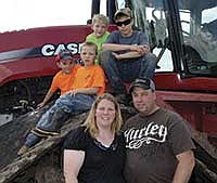 Dale and Tori Shelley milk 75 cows on their farm in Mille Lacs County near Princeton, Minn. They are pictured with their four boys, from left, Jack, Max, Owen and Alex.<br /><!-- 1upcrlf -->PHOTO BY MISSY MUSSMAN